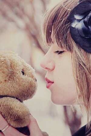 Girl Kissing Teddy Bear Mobile Wallpaper