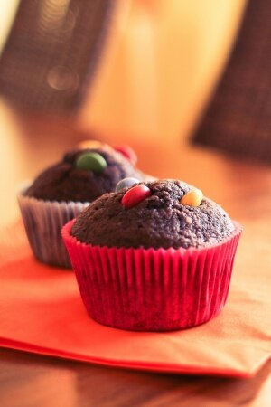 Two Delicious & Yummy Muffins Mobile Wallpaper